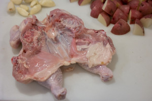 Spatchcock chicken with backbone removed and flattened