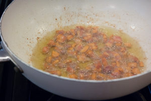 crispy pancetta rendering in olive oil
